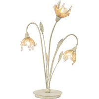 Traditional and elegant table lamp in a cream and gold finish with leaf decoration complete with att