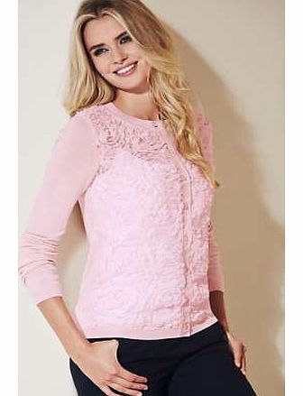 Ladylike and feminine, this gorgeous cardigan oozes charm. The mix of fabrics, pretty chiffon roses and soft viscose blend yarn, makes it a special, unique piece. Scoop neckline and front button fastening.Cardigan Features: Washable 60% Viscose, 40% 