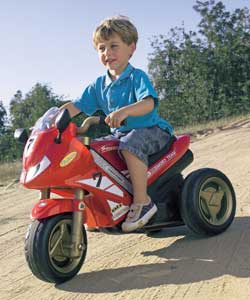 Chunky racing bike with 6v motor. Includes rechargeable battery and charger. Hand-operated button