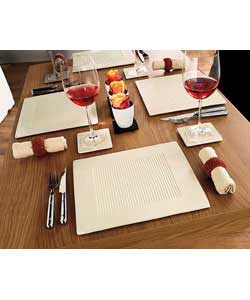 4 place settings. Heat resistant. Stain resistant. Wipe clean. Ceramic backing. Non slip. Size of pl