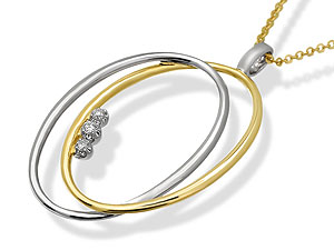 `Two ovals, one white and the other yellow gold create an interesting three dimensional design, with