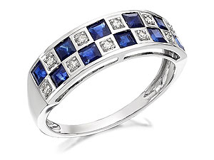 Square blue sapphires and square diamond accents alternate across the 2cm x 6mm front face of this ring creating an unusual checkerboard effect - would also look good as a ring for the little finger.