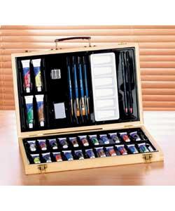 Presented in a smoothly finished hardwood case with leather look handles. Contents include 26