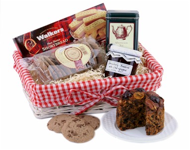Who could resist such a welcoming gift basket! Temptingly presented in a red gingham basket the