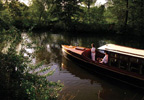 Cruise along the charming Kennet and Avon waterway in a fine 1923 Thames river launch with this luxu