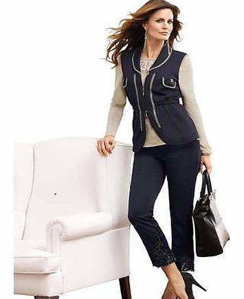 This eye-catching jersey gilet has lovely contrasting piping on the shawl collar, front and breast pockets. Featuring a 2 way zip and a stylish, rounded hem. Alessa W. Gilet Features: 2 way zip Flattering fit Delicate wash max. 30C 75% Polyester, 23