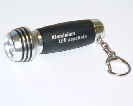 LED Keychain This smart and stylish torch features an aluminium body wrapped with rubber. It works b