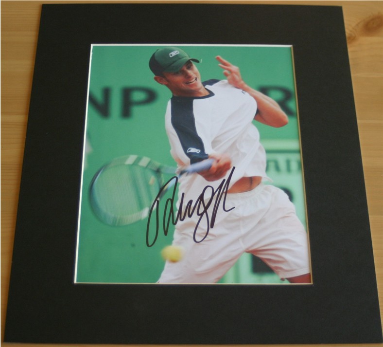 Superb signed photograph of Andy Roddick - signed clearly in black pen and professionally mounted
