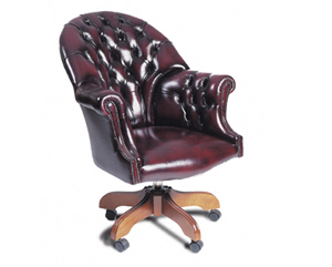 Luxurious hand finished executive swivel chair. Replica wood veneered. Classic directors design with
