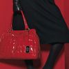 Exclusively available from APART: beautiful bag made from quilted patent leather. Elegant tag with A
