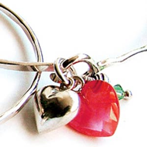 Azuni London Designer Jewellery 2005 Collection. A delicate silver bangle with a faceted Cherry