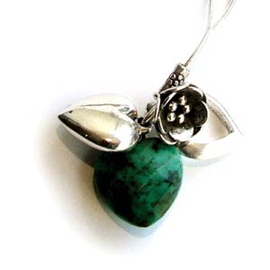 Azuni London Designer Jewellery 2005 Collection. Silver link chain bracelet with a small, detailed