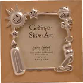 A beautiful satin finish silver plated wooden baby photo frame. A great way to display your