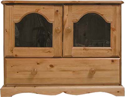 PINE SMALL 2 GLAZED DOORS AND DRAWER TV UNIT.THE DRAWERS HAVE DOVETAILED JOINTS WITH TONGUE AND