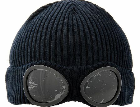 C. P Company Goggle Beanie Hat features ribbed fabric with goggle inserts and is made of wool great for keeping you warm in the winter weather and cold breeze team with a goggle jacket and gloves to complete the look. Colour: Navy Fabric: 100% Wool C