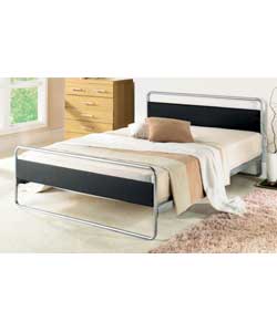 Double bedstead with faux leather panels on head/footboards. Metal and faux leather frame.Deluxe