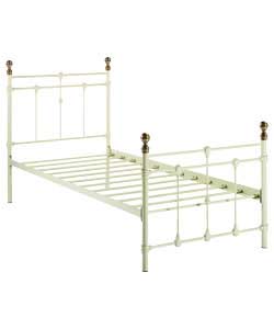 Ivory colour bedstead with antique brass colour finials.Metal frame.Overall size (H)113.5, (W)96,