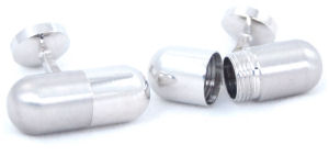 Cool silver coloured capsule cufflinks which actually twist apart for secret storage.