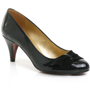 Patent court shoe with suede overlay detail. The Carbow courts have a low heel and almond toe to mak