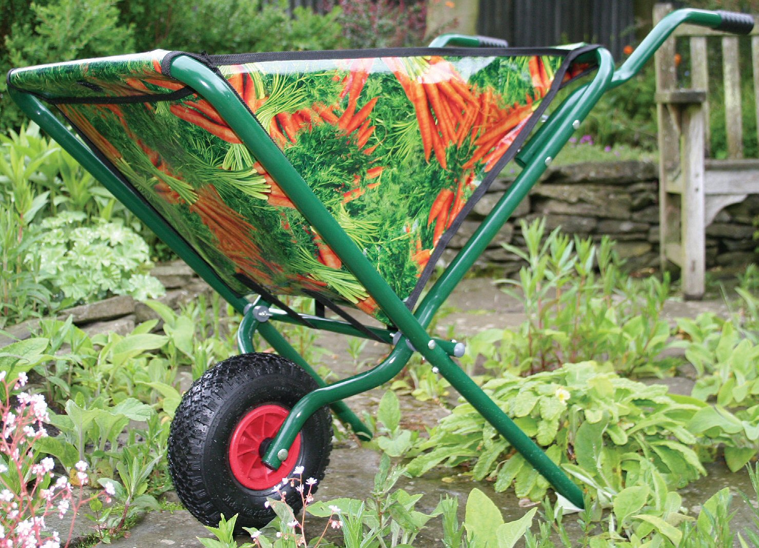 This folding wheelbarrow with its distinctive carrot print design is a great addition to any garden.