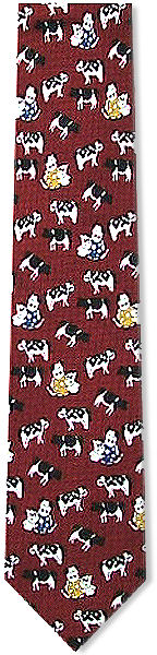 A fun tie with lots of little cows on a striped red background