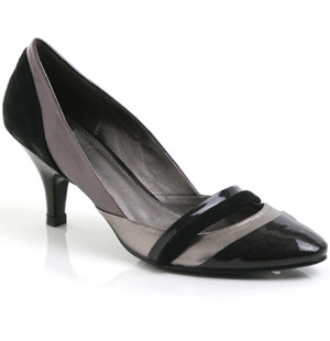 Pointed toe patent and leather court shoe featuring double dolly strap and a low heel. Smart and sty