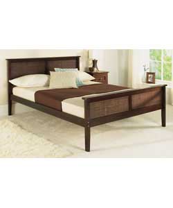 Pine wood and wicker double bedstead with chocolate finish. Includes luxury firm mattress. Size