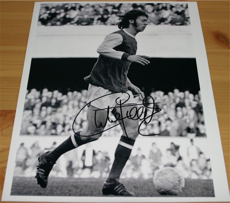Signed clearly in black pen by the Arsenal legend Charlie George. COA - 0420000243