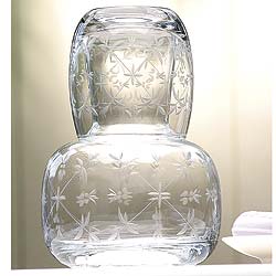 Once a feature of every well-appointed guest room, our glass water carafe and tumbler are decorated