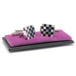 These cufflinks feature a chequered flag design. They are made from stainless steel and feature a pu