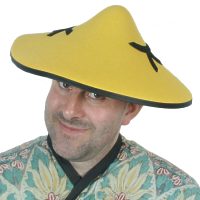 A yellow cooli hat decorated with black calligraphy for dressing up