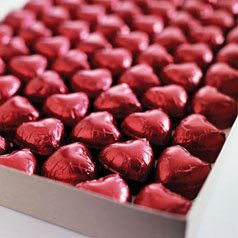 A tray of milk chocolate hearts filled with delicious chocolate truffle centre and wrapped in a pret