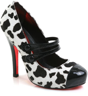 Round toe fine hair finish leather court shoe featuring patent toe cap, buttoned dolly straps and al