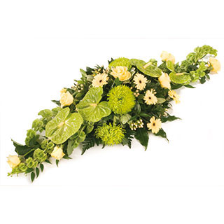 A modern and contemporary double ended spray using striking lime greens and warm cream shades