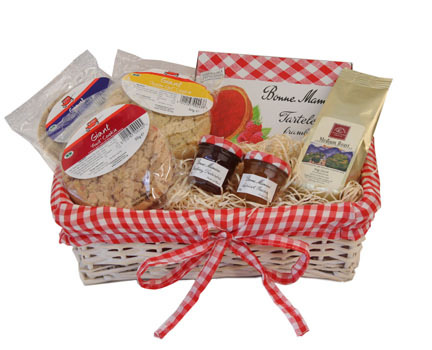 Send delicious cookies in a delightful red gingham lined wicker basket. Includes 3 giant cookies  a 