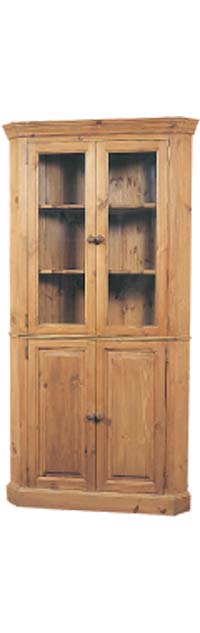 This corner cupboard is a great space saver.  It has two glazed doors and two panelled doors