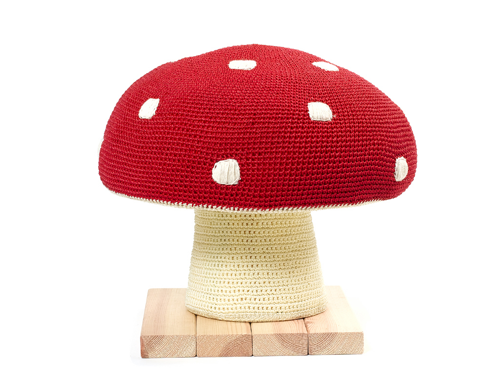 The perfect stool for little imps. Handcrafted from soft, crocheted cotton, with a sturdy stand. For
