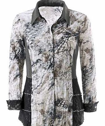 Slight crushed look blouse with lace inserts on the front and lace details on the collar and cuffs. With long sleeves and stretch jersey fabric inserts at the sides for maximum comfort. Blouse Features: Lace detail Long sleeves Washable 100% Cotton L