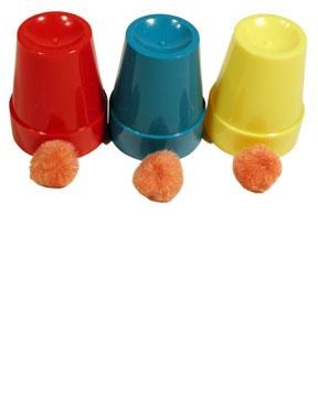 Three solid cups are shown. Three unprepared balls are shown.The balls then penetrate the bottom of