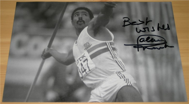 DALEY THOMPSON HAND SIGNED 10 x 7 INCH B/W PHOTO