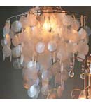 An original, contemporary-styled non electric chandelier which is beautifully tiered with lots of in