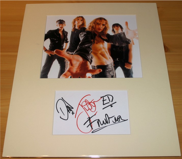 The signatures of Justin  Dan  Ed and Frankie from the massive British rock band The Darkness