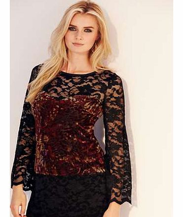 This is a great piece for an evening out. Just team up with the velour trousers and your outfit is ready. The sexy sheer sleeves and sweetheart neckline are a fab combination. Tunic Features: Washable 66% Polyester, 26% Polyamide, 8% Elastane Lace: 9