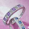 9ct white gold diamond eternity ring set with a choice of tanzanite or pink sapphire.