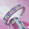 9ct white gold diamond eternity ring set with a choice of tanzanite or pink sapphire.