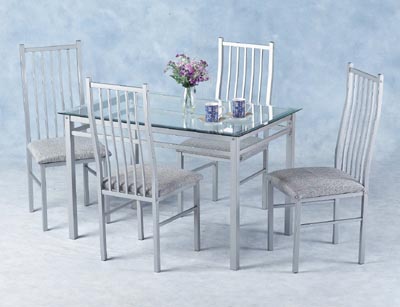 RECTANGULAR GLASS TABLE AND FOUR UPHOLSTERED CHAIRS.THIS STYLISH COMBINATION OF SILVER AND GLASS IS