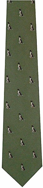 A lovely tie with a brown and white dog sitting on an olive green background