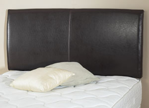 A luxurious Wave style leather headboard in Dark Brown
