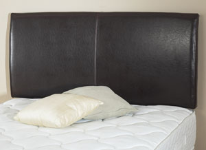 A luxurious Wave style leather headboard in Dark Brown