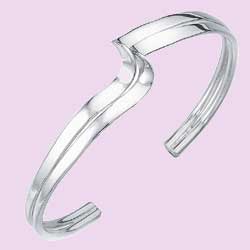 An alluring bangle with double wave design.925 Sterling Silver